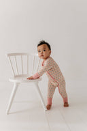 Babysprouts Long Sleeve Zip Romper: Framed Flower