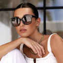 Freyrs Cat Eye Sunglasses: Black